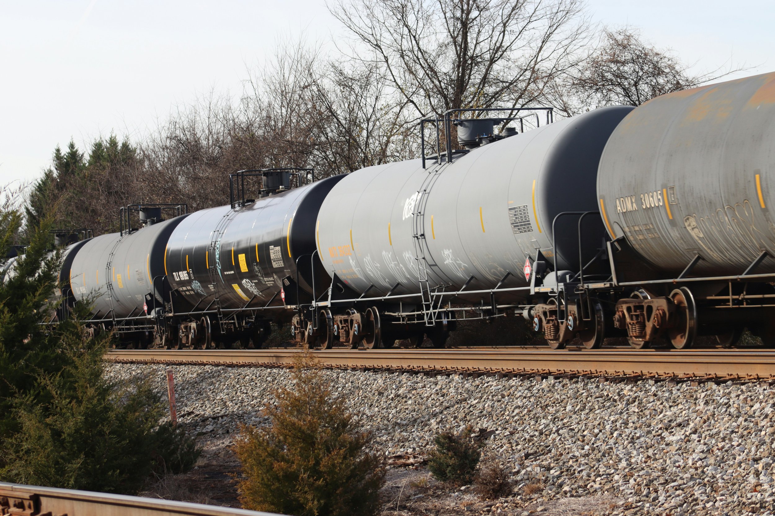 Rail tank cars on freight tracks